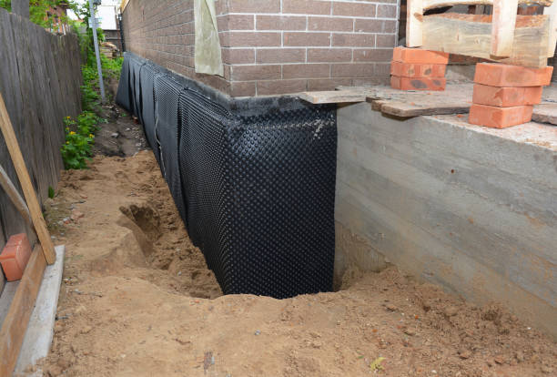 SJ Waterproofing Pros technician performing targeted Waterproofing assessment in Ridgefield, WA